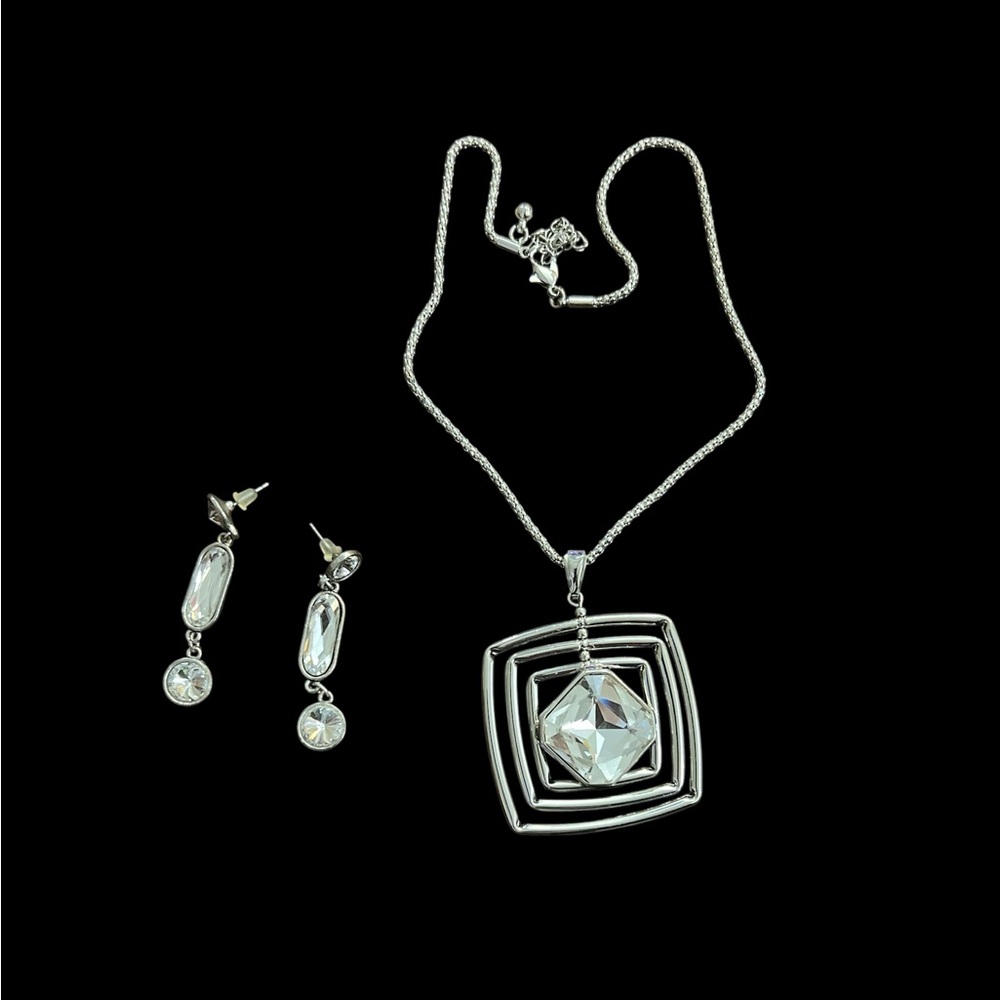 Elegant Twirling Silver Necklace and Earring Set